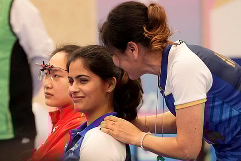 India's Manu Bhaker with her coach